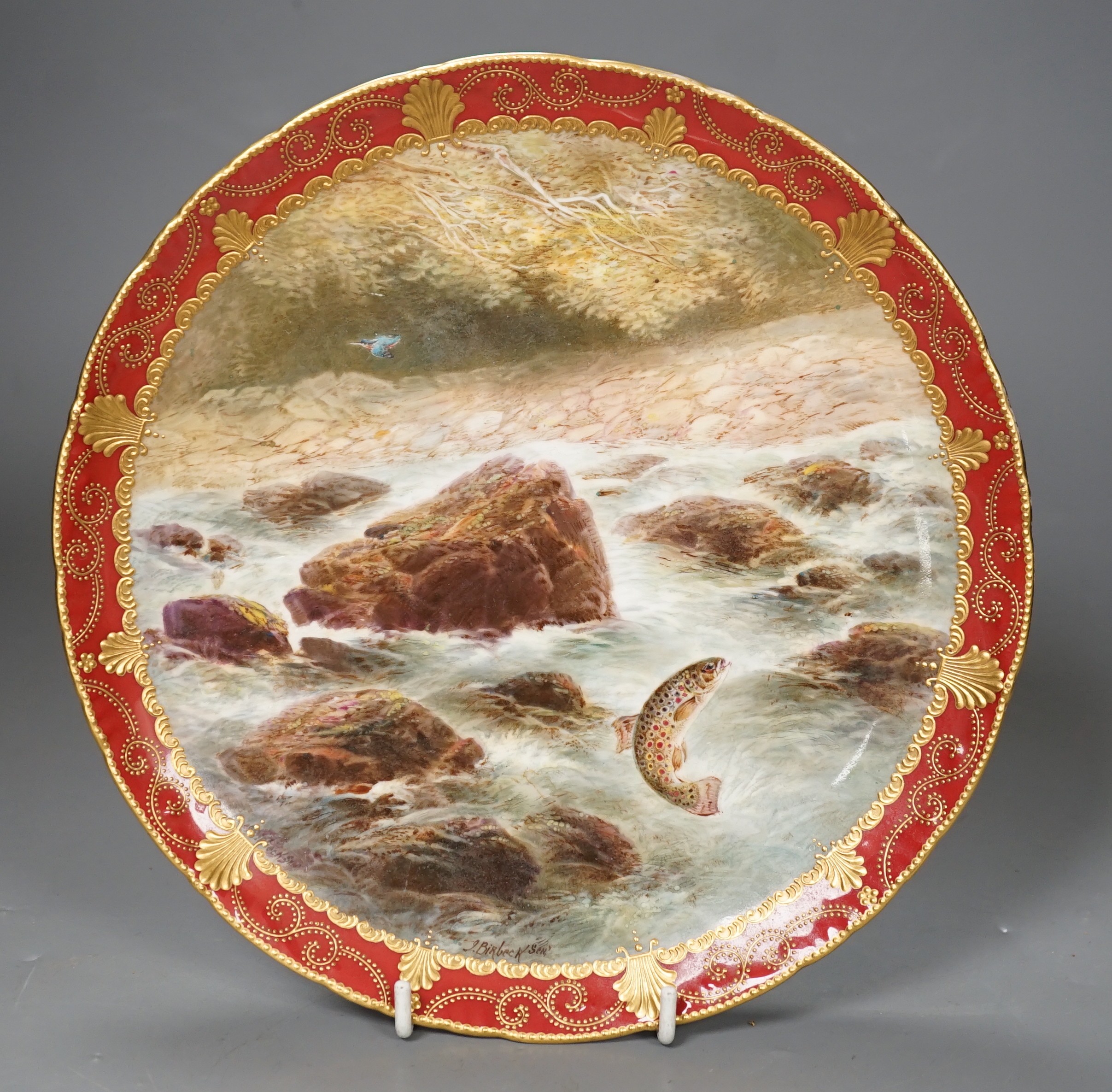 Joseph Birbeck Senior for Cauldon, a cabinet plate painted with a leaping salmon, signed, 22cm diameter